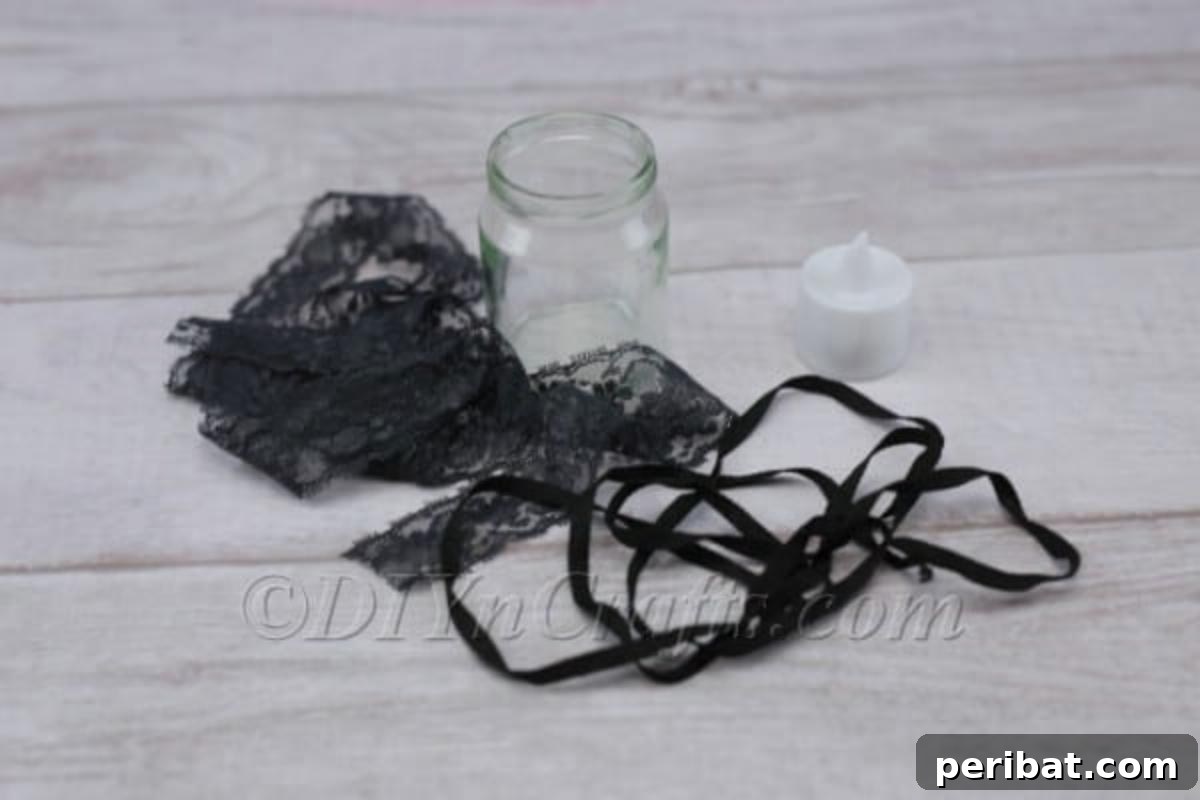 Craft a Charming Lace Lantern Effortlessly 3 Materials laid out for making a lace jar lantern: rolls of lace and ribbon, hot glue gun, scissors, a clean glass jar, and an LED candle.