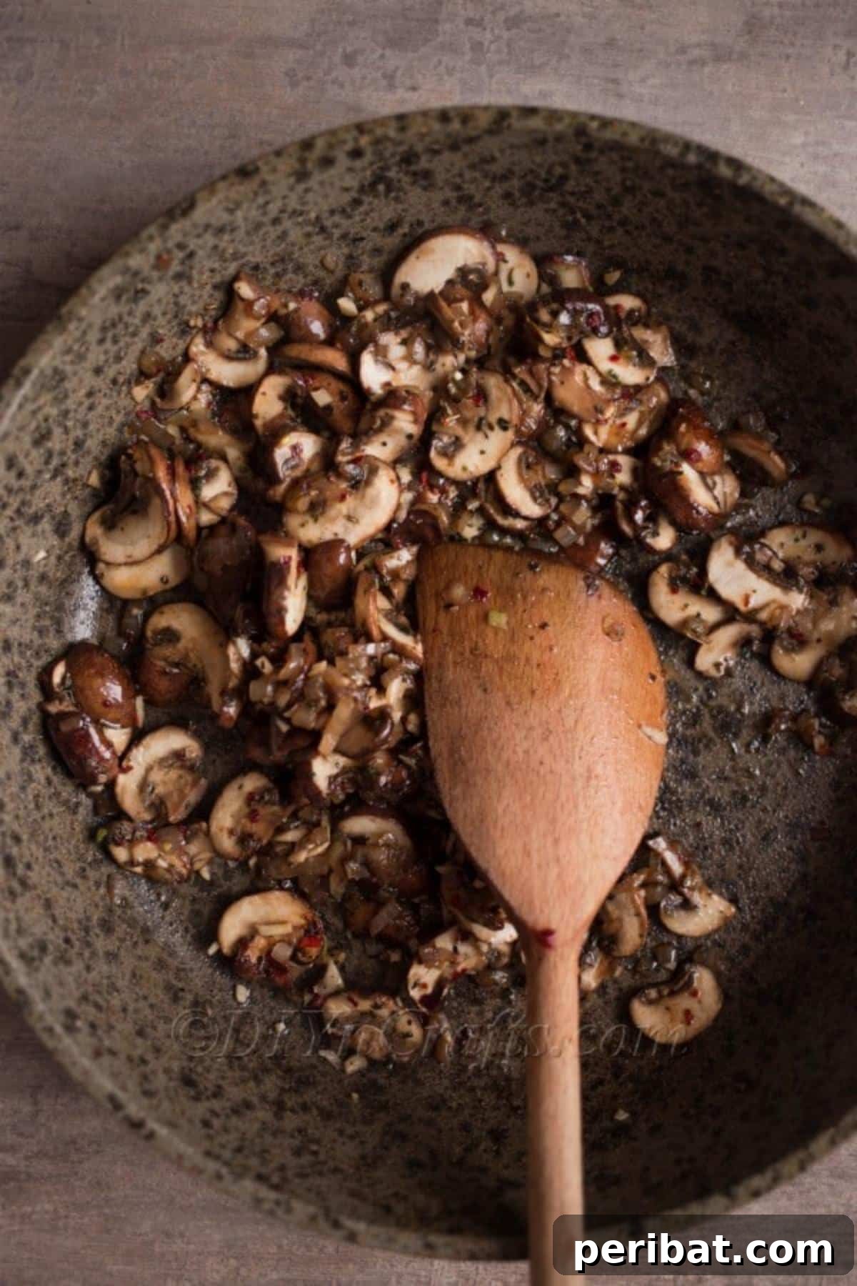 Sautéing mushrooms and onions.