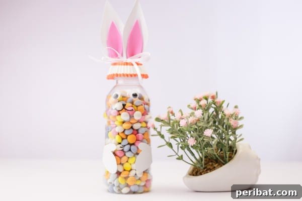 An adorable DIY Easter Bunny Candy Bottle, perfect for holding treats.