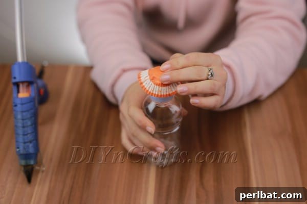 Candy cup firmly attached to bottle cap