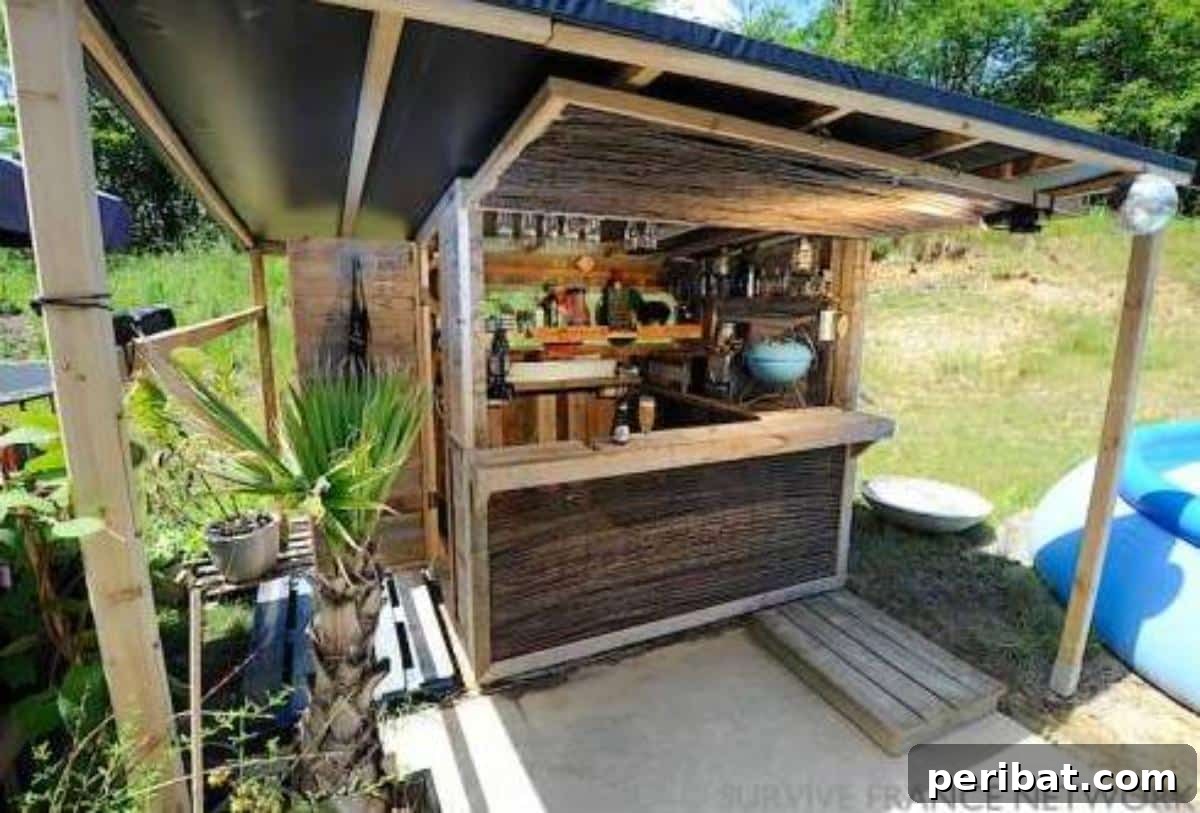 DIY Outdoor Oasis: 10 Projects for Beauty and Bliss 9 A vibrant DIY beach bar made from repurposed pallets, set up in an outdoor space.