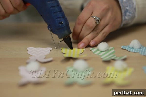 Attaching cotton tails with hot glue