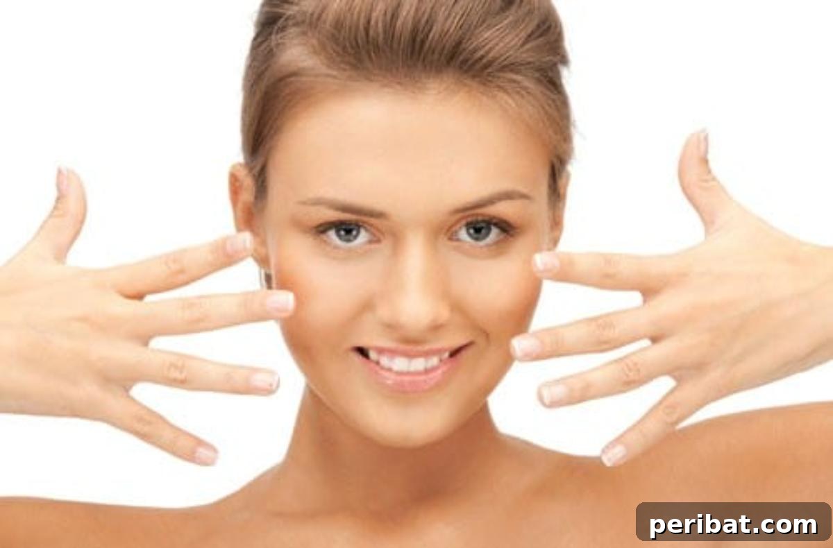 Woman showing her hands with beautiful, healthy nails
