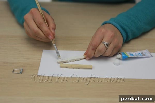 Step 2: Paint clothespin halves white