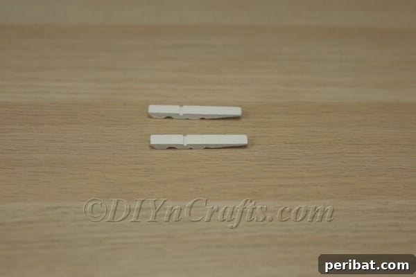Clothespin halves painted white