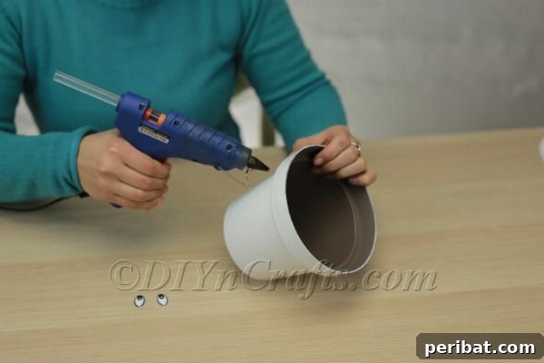 Gluing rosy cheeks to the planter
