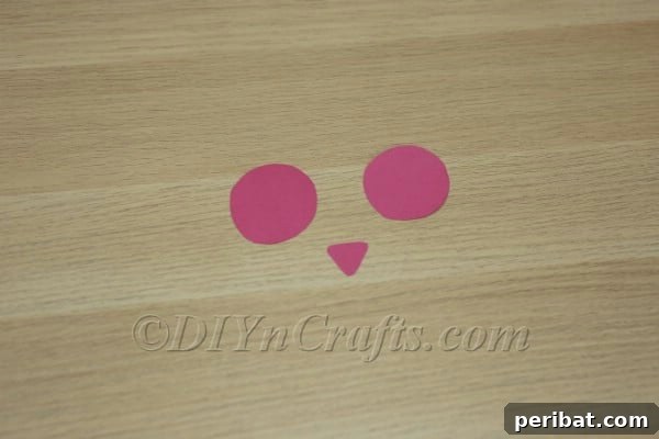 Pink paper cutouts for bunny's face