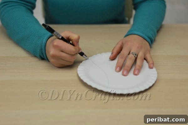 Three Adorable Easter Bunny Crafts Using Paper Plates 14 Using the first ear as a template for the second