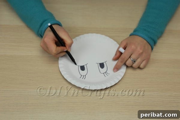 Three Adorable Easter Bunny Crafts Using Paper Plates 17 Drawing bunny eyes on a paper plate