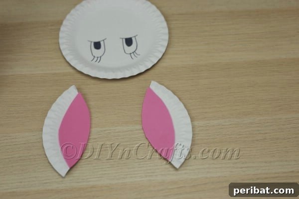 Three Adorable Easter Bunny Crafts Using Paper Plates 18 Cutting out pink foam for inner bunny ears