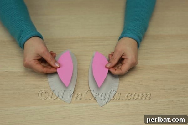 Two paper plate bunny ears for the basket