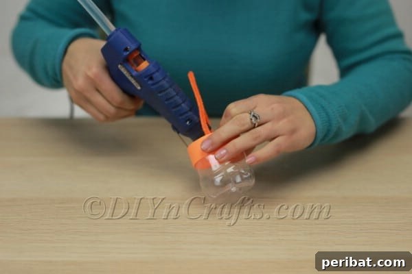 From Trash to Treasure: DIY Plastic Bottle Easter Baskets 10 Attaching Pipe Cleaner Handle