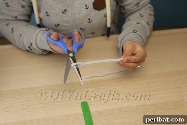 Craft Your Own Adorable Easter Bunny Nose 7 Step 2: Cutting white pipe cleaners into segments for bunny whiskers