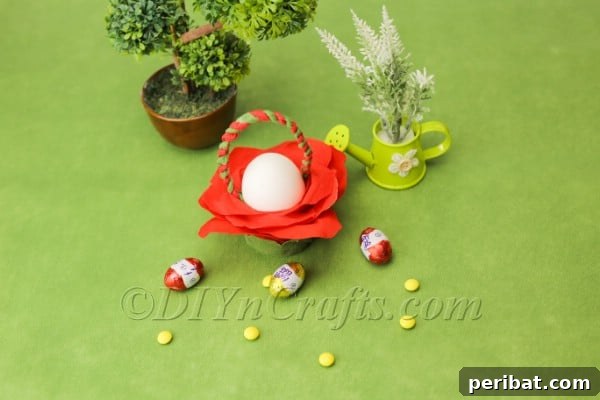 Blossoming Beauty: Craft Your Own Single Egg Easter Basket 24 Step 14: Attaching the finished handle to the Easter basket with hot glue.