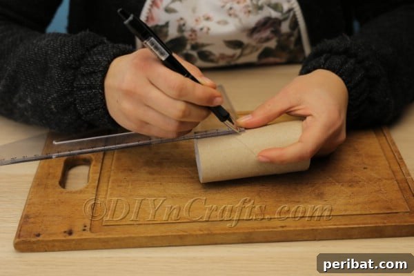 Blossoming Beauty: Craft Your Own Single Egg Easter Basket 6 Step 3: Using a scalpel for a clean cut on the toilet paper tube.