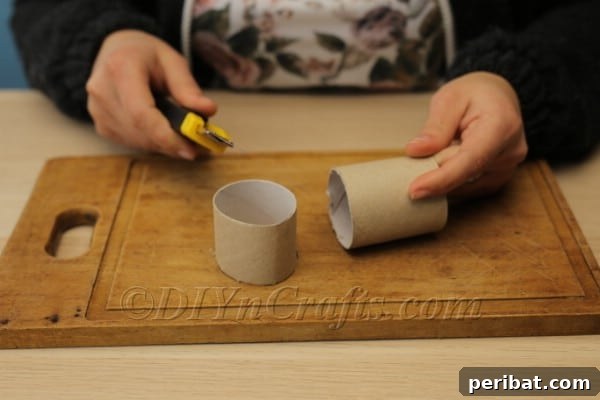 Blossoming Beauty: Craft Your Own Single Egg Easter Basket 7 Step 3: Alternative method, carefully cutting the toilet paper tube with scissors.