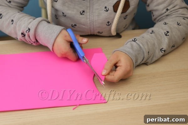 Craft Your Own Adorable Easter Bunny Cups 7 Cutting pink foam for inner ears