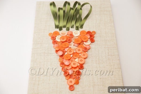 Easter carrot wall art displayed on a table.
