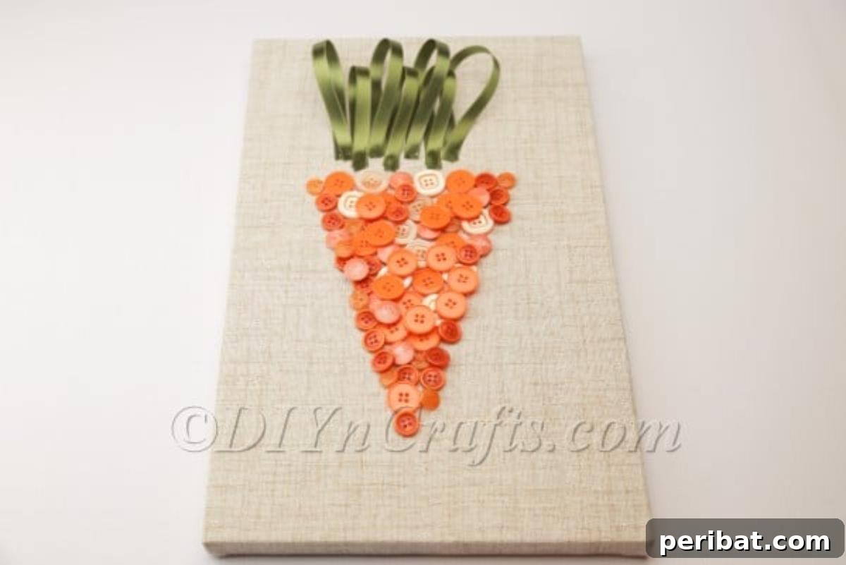 Whimsical Button Carrot Wall Art for Easter 3 Close-up of the finished button carrot wall art, showcasing texture and color.