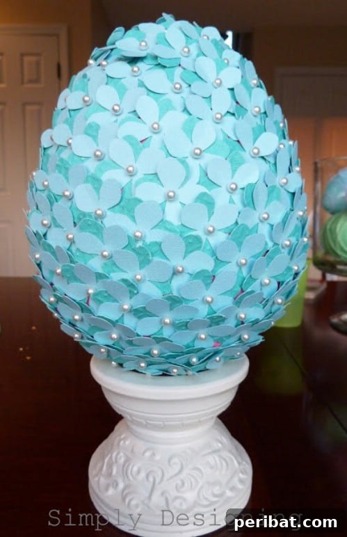105 Creative DIY Easter Decor Ideas 46 Flowered Egg Topiary with Foam Egg and Paper Flowers
