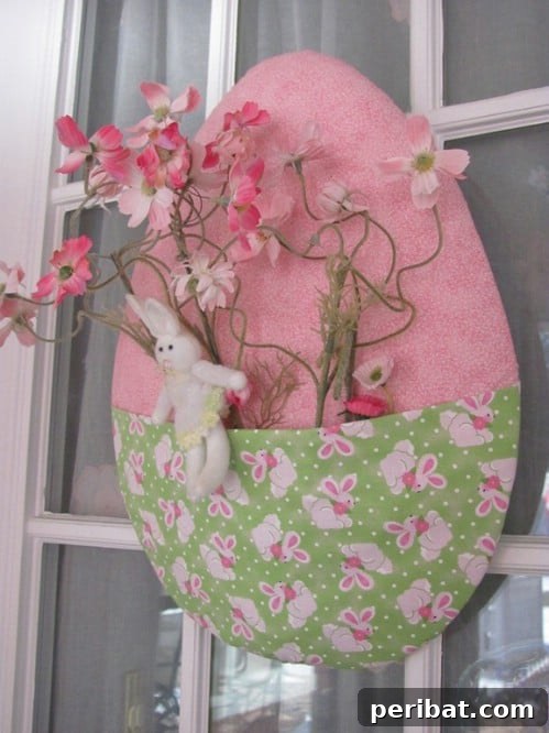 105 Creative DIY Easter Decor Ideas 79 DIY Easter Egg Door Decor with Fabric Pocket