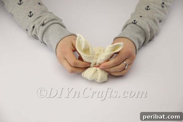 Sweet Towel Bunnies: An Easy Easter DIY 8 The towel bunny's body and ears are shaped and ready.