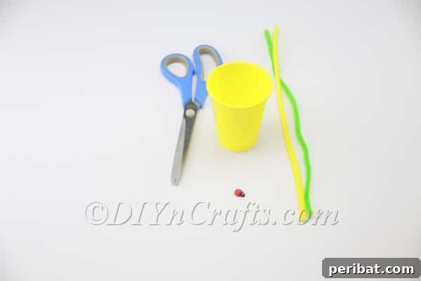 Transform a Plastic Cup into an Adorable Easter Basket 3 Cutting vertical strips into a plastic cup for Easter basket
