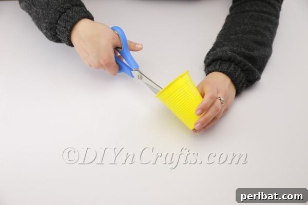 Transform a Plastic Cup into an Adorable Easter Basket 4 Plastic cup with evenly cut strips