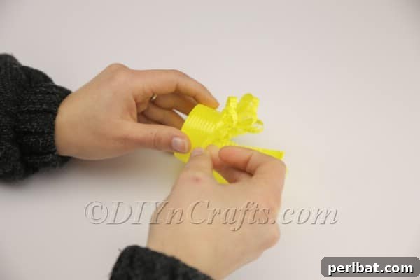 Transform a Plastic Cup into an Adorable Easter Basket 8 Completed looped edge of the plastic cup basket