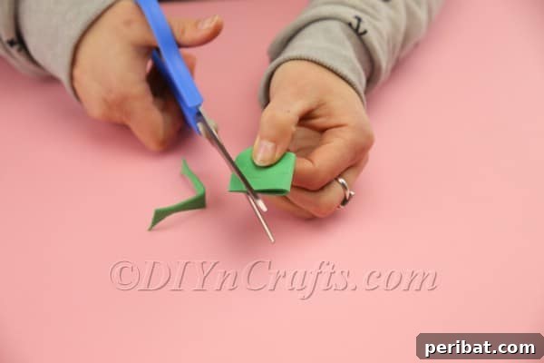 Hoppy Easter Egg Bunny Craft 17 Cutting inner bunny ears from green foam sheet