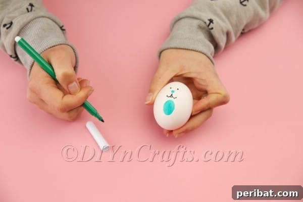 Hoppy Easter Egg Bunny Craft 7 Adding the nose and belly to the Easter egg bunny