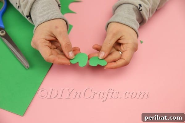 Hoppy Easter Egg Bunny Craft 10 Gluing two layers of bunny feet together