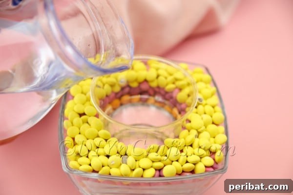 Pouring water into the inner cup for fresh flowers
