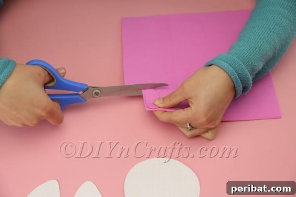 DIY Sweet Easter Bunny Treat Pouch Free Printable 12 Cutting paw pads from pink foam