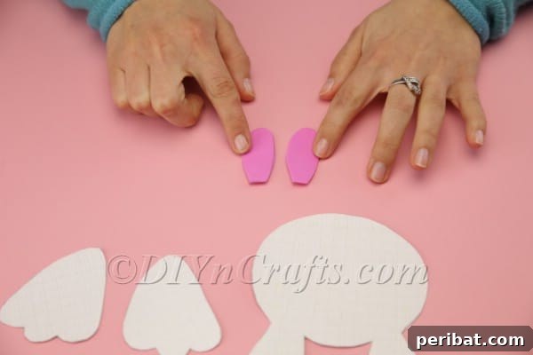 DIY Sweet Easter Bunny Treat Pouch Free Printable 13 Cutting inner ear shapes from pink foam