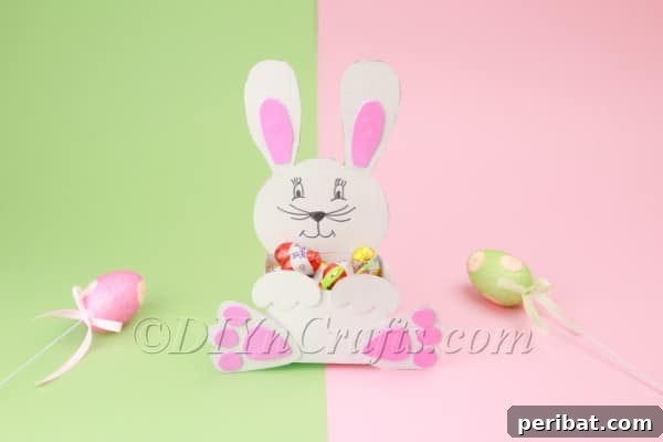 DIY Sweet Easter Bunny Treat Pouch Free Printable 26 Adding candies to Easter bunny holder