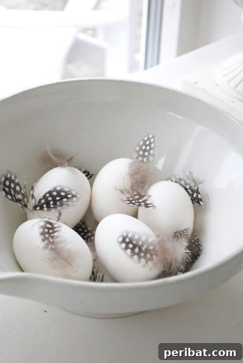 80 Captivating Easter Egg Art & Craft Ideas 22 Feathered Easter Eggs - 80 Creative and Fun Easter Egg Decorating and Craft Ideas