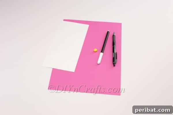 DIY Cute Paper Easter Bunny Candy Holder 4 Materials laid out for the Easter bunny craft