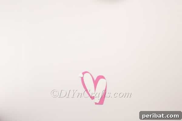 DIY Cute Paper Easter Bunny Candy Holder 8 Cutting the white inner ears for the bunny