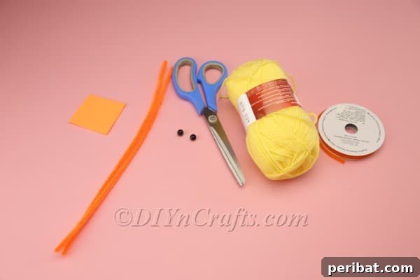 Two pom-poms for Easter chick body and head