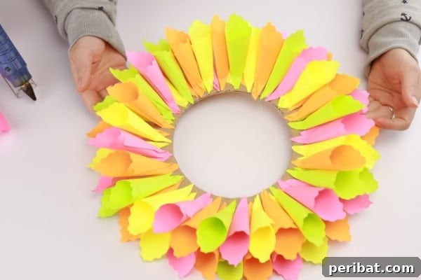 Transform Sticky Notes into a Vibrant Easter Wreath 14 Attached every sticky note nearly finished wreath - Two layers completed