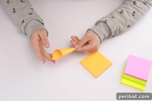 Transform Sticky Notes into a Vibrant Easter Wreath 9 Folding the sticky notes - Shaping the cone
