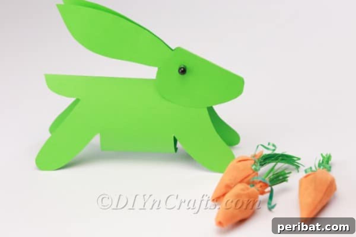 Craft a Charming Paper Easter Bunny 3 Finished paper bunny with cute paper carrots.