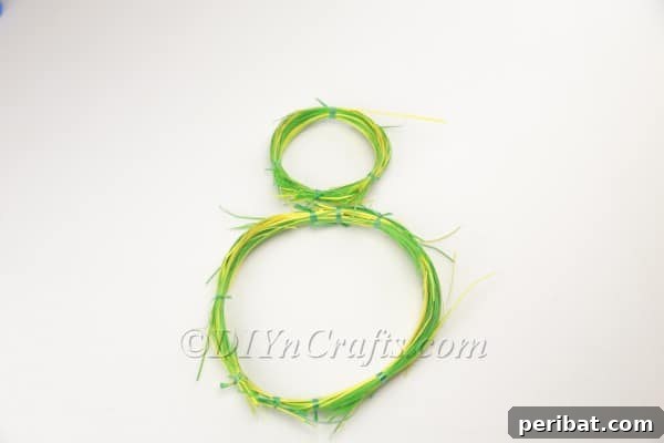 Craft an Adorable Bunny Easter Wreath 11 Repeating the bundling steps to create a smaller circle for the bunny's head.