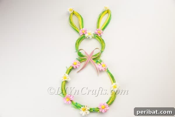Craft an Adorable Bunny Easter Wreath 17 Close-up of the completed and decorated Easter bunny wreath, highlighting details.