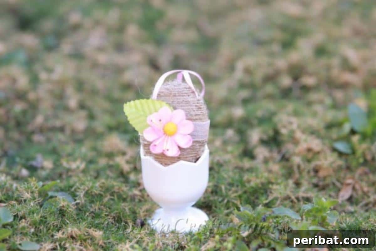 Farmhouse Style Twine Easter Eggs 16 Twine Easter egg decor placed in an egg holder.