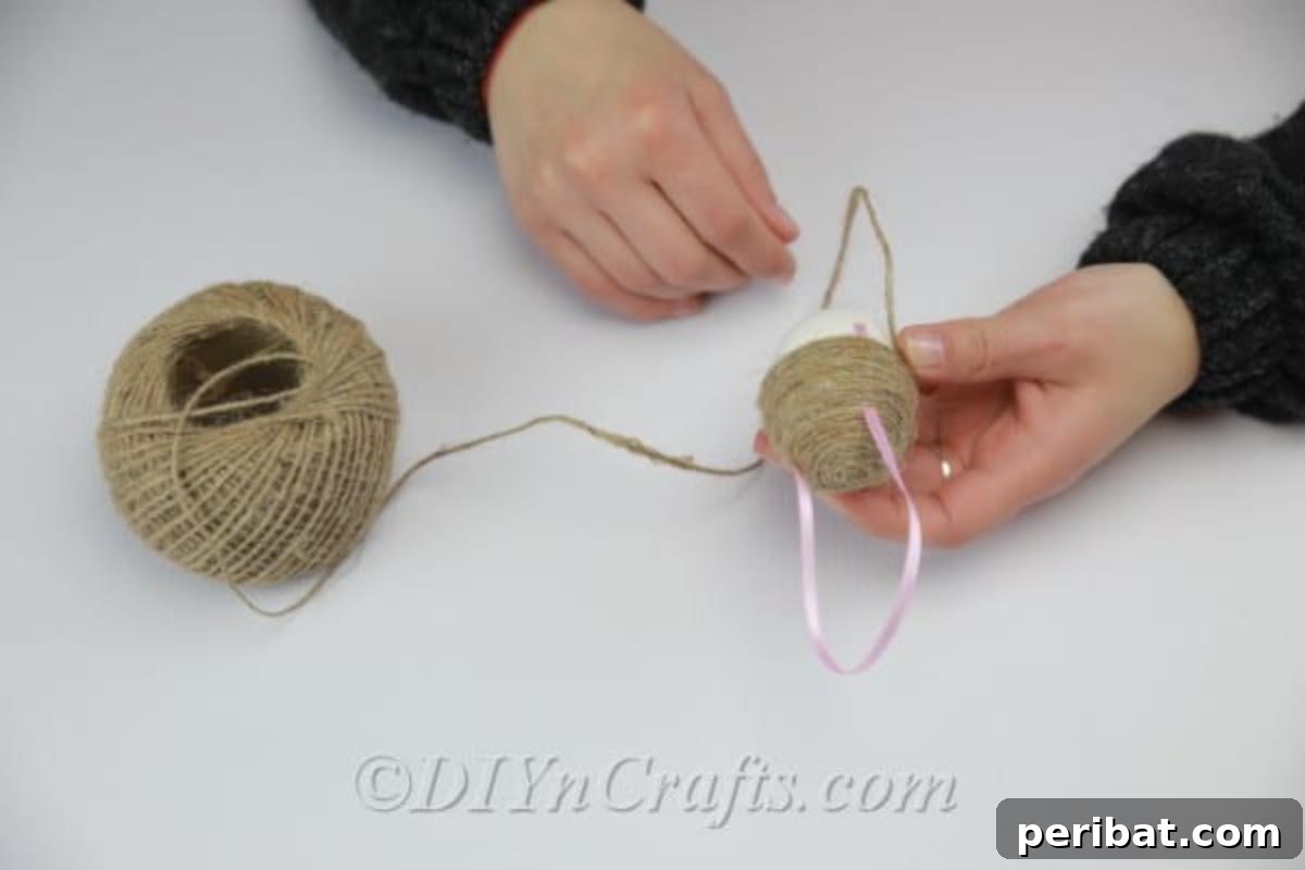 Farmhouse Style Twine Easter Eggs 8 Half finished twine covered egg decoration.