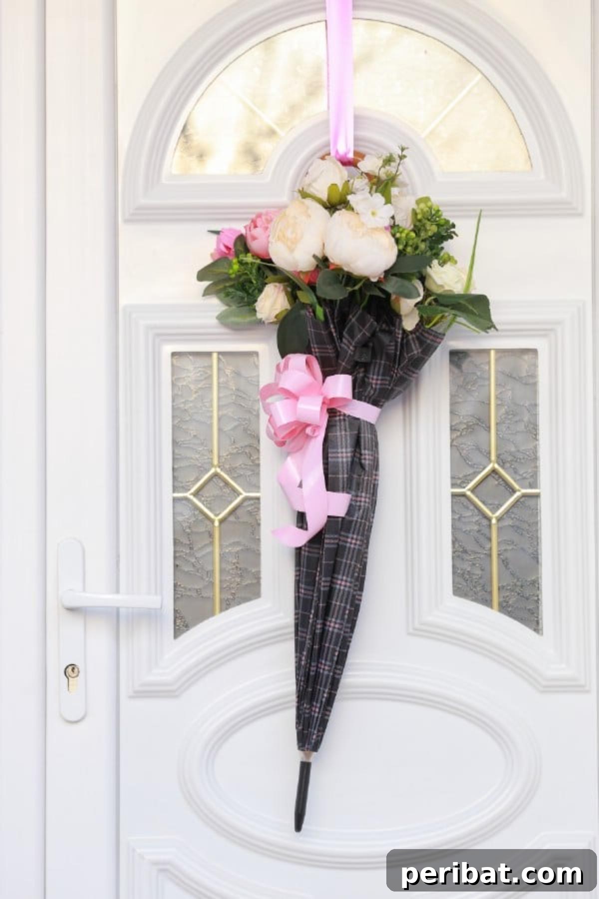 Finished DIY Umbrella Bouquet Door Decoration, a perfect welcome for spring and Easter.
