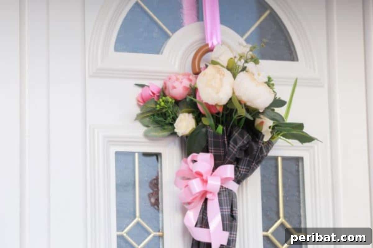 Close-up of the beautiful Finished Umbrella Bouquet Door Decoration, ready to greet guests.