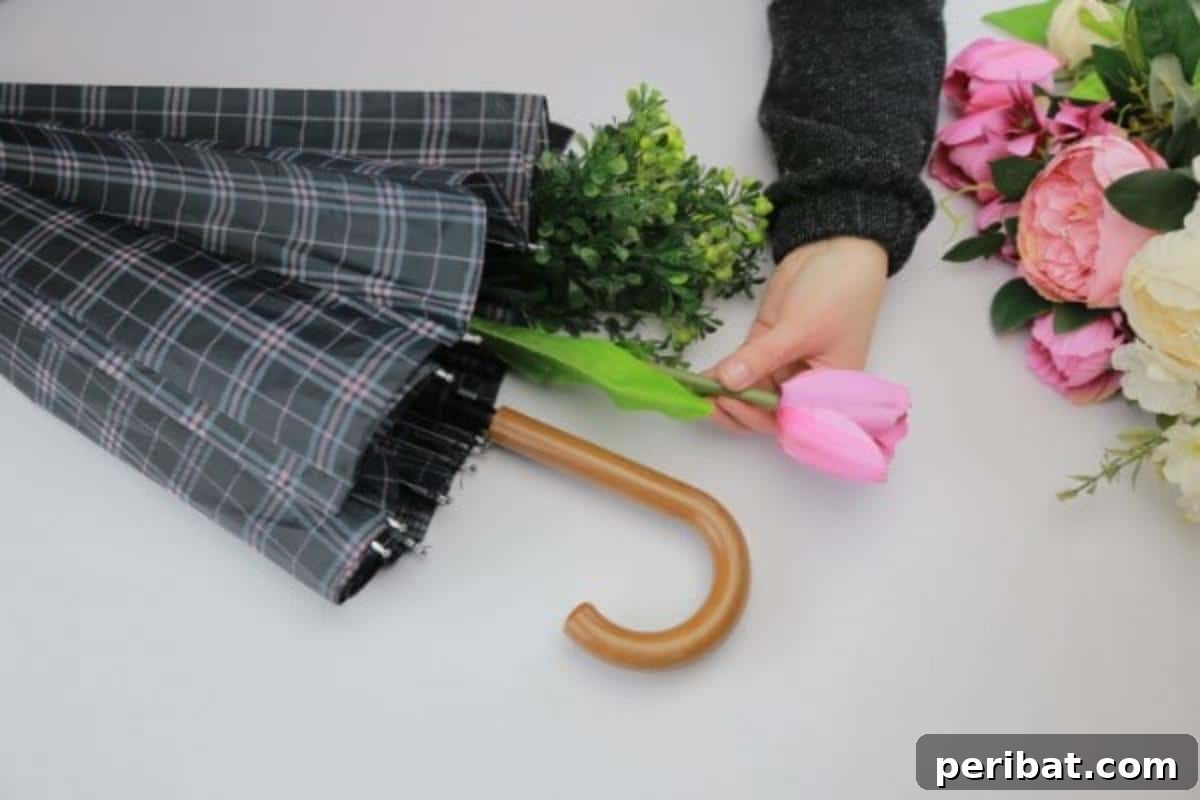 Fill the umbrella with a vibrant assortment of real or faux flowers for your DIY Easter decor.